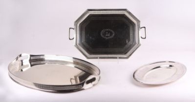 A large George III style silver plated galleried two-handled tray, initialled, 63cms long;