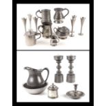 A quantity of pewter ware including a pair of Spanish alter candlesticks, stamped Pedraza Segovia,