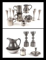 A quantity of pewter ware including a pair of Spanish alter candlesticks, stamped Pedraza Segovia,