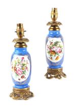 A pair of gilt metal mounted Sevres style porcelain table lamps, 24cms high excluding fittings (