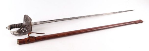 An 1897 Pattern George V dress sword in leather scabbard, 101cm long.