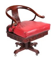 A Chinese hardwood revolving desk chair.