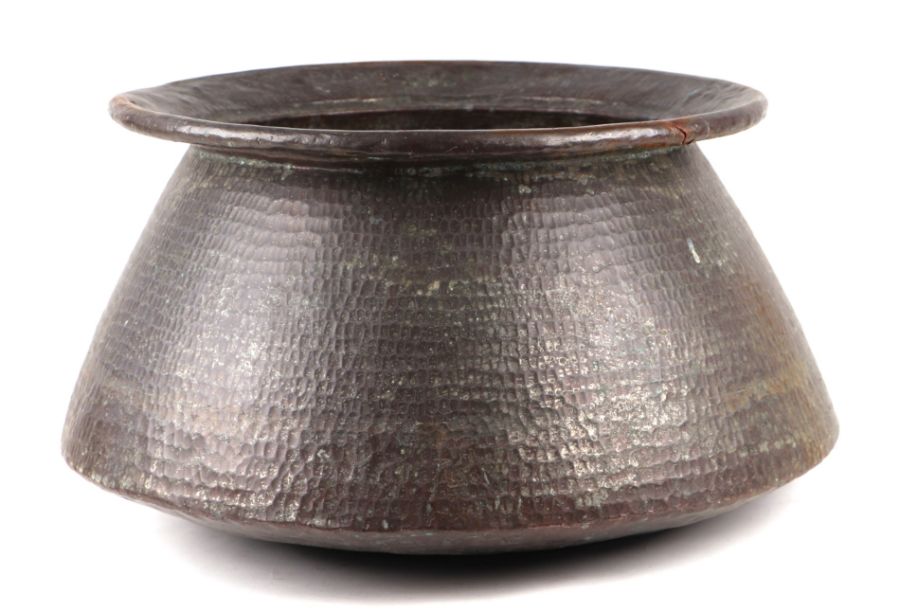 A large Islamic copper bowl with flared rim, 54cms diameter, 28cms high.