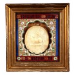 A continental wax plaque for Gregory XVI with central sheep holding a flag armorial within script,