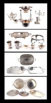 A quantity of silver plated items to include trays, candlesticks and tea sets.