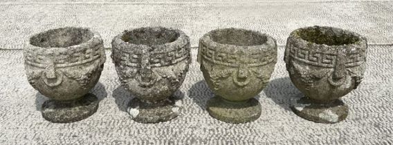 A set of four well weathered reconstituted stone urn form planters, 23cm diameter, (4)