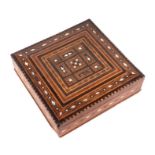 A Cairo ware wooden box with inlaid mother of pearl and geometric wooden inlay, 26cms wide.