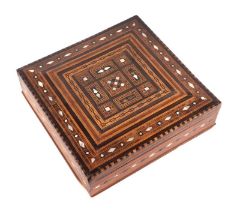 A Cairo ware wooden box with inlaid mother of pearl and geometric wooden inlay, 26cms wide.