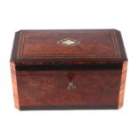 A Victorian amboyna wood tea caddy of rectangular form with canted corners, inlaid with mother of