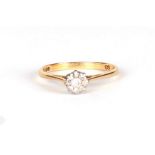 An 18ct gold diamond solitaire ring, approx UK size N, 2.2g.