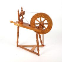 An oak spinning wheel.