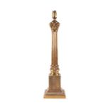 A brass Corinthian column table lamp, 47cms high.