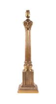 A brass Corinthian column table lamp, 47cms high.