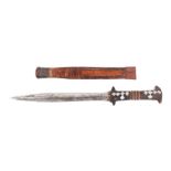 A North African dagger with hardwood handle and leather sheath.