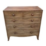 A 19th century mahogany chest with two short and three graduated long drawer standing on bracket