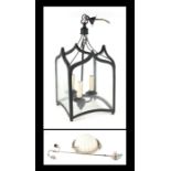 A Gothic style hall lantern; together with a frosted glass ceiling light (2).