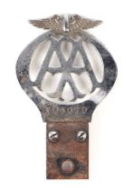 An Automobile Association (AA) Member's badge, no. 70407D, issued between 1932 - 34.