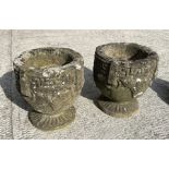 A pair of reconstituted stone planters, 25cms high; together with two concrete garden animals (4).