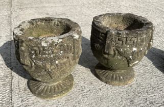 A pair of reconstituted stone planters, 25cms high; together with two concrete garden animals (4).