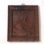 A cast iron plaque depicting Jesus, 37 by 43cms.