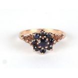 A 9ct gold sapphire cluster ring, approx UK size O, 2.2g.