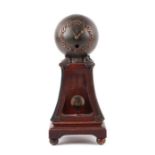 An early 20th century novelty globe mantle clock, the brass globe dial with Arabic numerals, on a