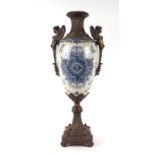 A bronze mounted two-handled blue & white vase, 54cms high.