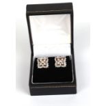 A pair of 9ct gold diamond cluster stud earrings.