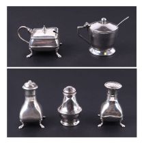 A three-piece silver cruet set; together with a silver pepper pot and a silver mustard pot,