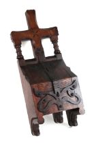 A Gothic Revival oak and wrought iron church collection or money box, 64cms high.