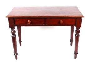 A Victorian mahogany side table with two frieze drawers, on turned legs, 104cms wide.