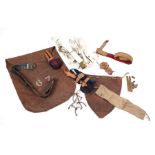 Militaria. Lifeguards. Two pairs of leather breeches and braces, leather helmet bag, two pairs of