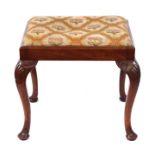 A 19th century walnut stool on shell capped cabriole legs, 56cms wide; together with a 19th