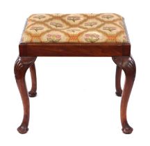 A 19th century walnut stool on shell capped cabriole legs, 56cms wide; together with a 19th