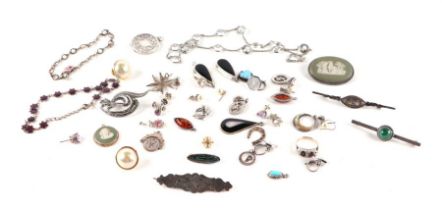 Assorted silver jewellery including green jasperware brooch, agate set locket, other brooches, rings