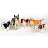 A Beswick Labrador; together with a Beswick King Charles spaniel; and other similar dogs (5).