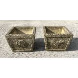 A pair of reconstituted stone planters of square tapering form, 26cms wide.