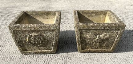 A pair of reconstituted stone planters of square tapering form, 26cms wide.