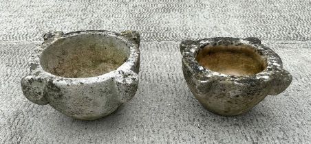 A marble mortar, 30cms diameter; together with a reconstituted stone mortar, 33cms wide (2).