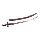 An Indian Tulwar sword with double fullered blade and disc hilt. Having a makers mark near the hilt,