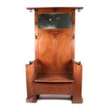 An early 20th century oak hall stand with box seat, 120cms wide.