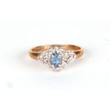 A 9ct gold sapphire and diamond cluster ring, approx UK size L, 1.9g.