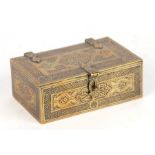 An Islamic brass miniature casket finely engraved with Koran inscriptions, 11cms wide.