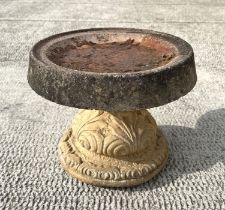 A reconstituted stone bird bath, 38cms diameter.