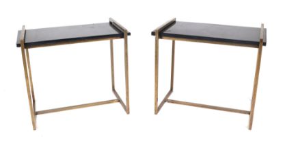 A pair of Helix side tables with brass frames and black granite tops, 41 by 66 by 56cms high (2).