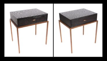 A pair of Julian Chichester Felix ebonised oak bedside tables with single frieze drawer, on gilded