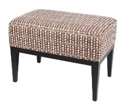 A Carolina Irving footstool upholstered in Amazon Earth fabric, 70 by 45 by 50cms high. Condition