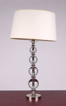 A Lausanne glass sphere and nickel table lamp, 49cms high excluding fittings. Condition Report