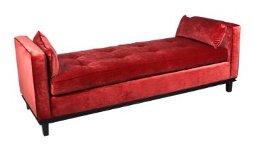 A bespoke daybed upholstered in Sanderson Chatham Brick Red fabric, max width 200cms, 70cms depth,