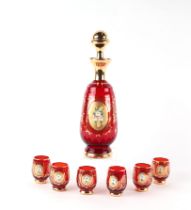 A Murano ruby glass liquor set comprising decanter and six glasses with enamelled floral